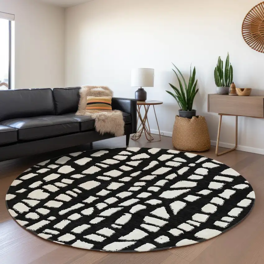 8' Black And Ivory Round Abstract Washable Indoor Outdoor Area Rug Photo 7