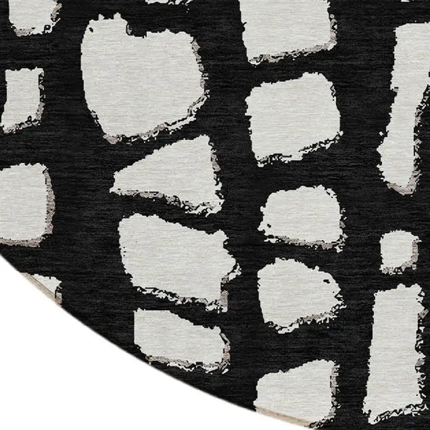 8' Black And Ivory Round Abstract Washable Indoor Outdoor Area Rug Photo 4