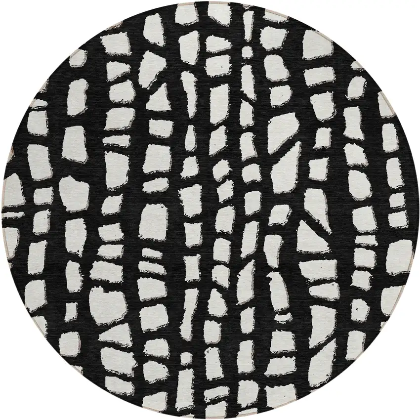 8' Black And Ivory Round Abstract Washable Indoor Outdoor Area Rug Photo 1