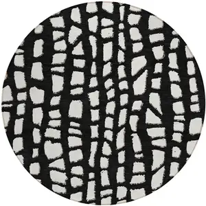 Photo of 8' Black And Ivory Round Abstract Washable Indoor Outdoor Area Rug
