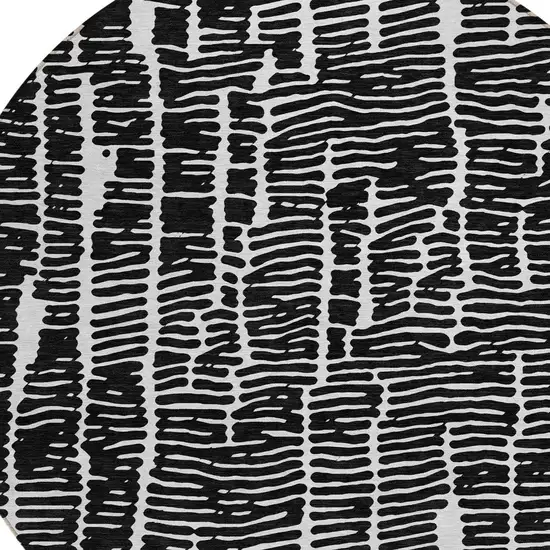 8' Black And Ivory Round Abstract Washable Indoor Outdoor Area Rug Photo 6