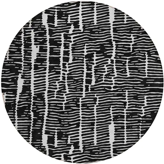 8' Black And Ivory Round Abstract Washable Indoor Outdoor Area Rug Photo 2