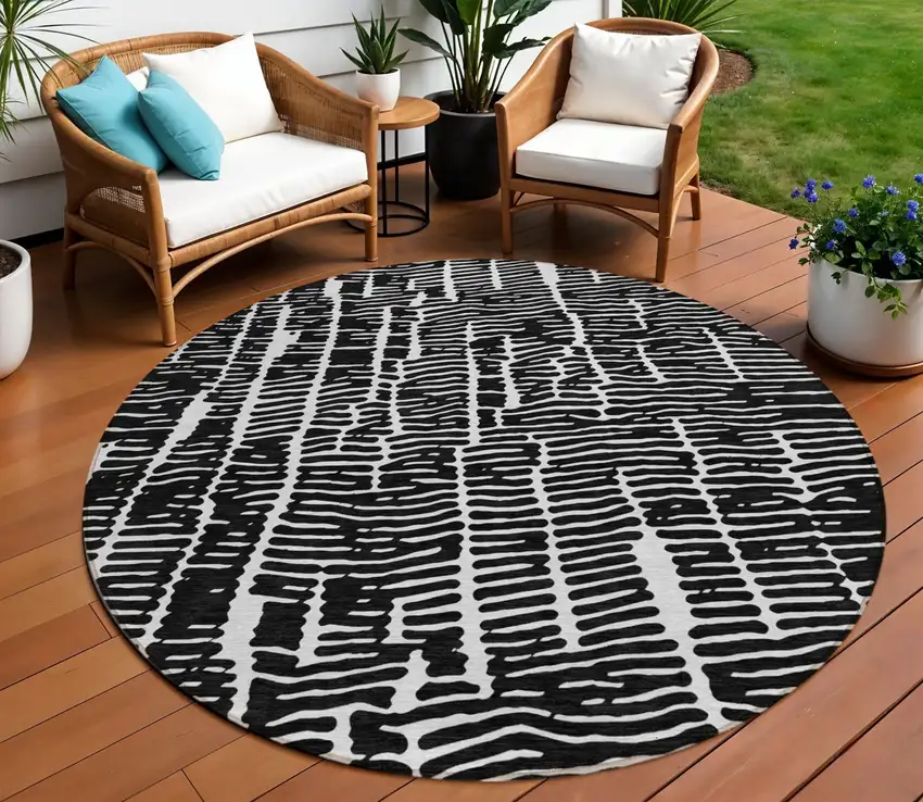 8' Black And Ivory Round Abstract Washable Indoor Outdoor Area Rug Photo 1