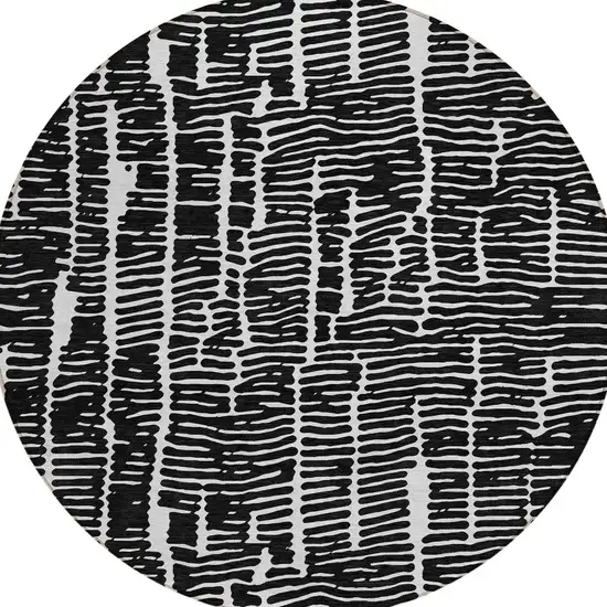 8' Black And Ivory Round Abstract Washable Indoor Outdoor Area Rug Photo 7