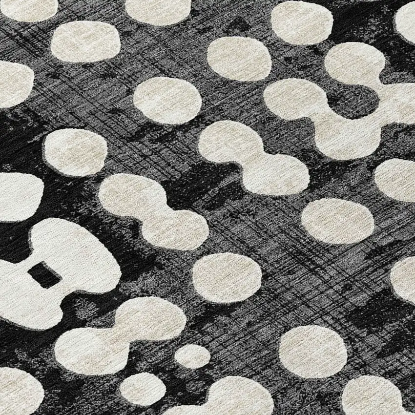 8' Black And Ivory Round Abstract Washable Indoor Outdoor Area Rug Photo 8