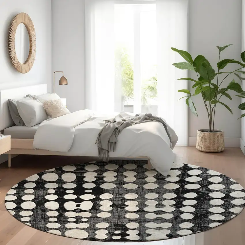8' Black And Ivory Round Abstract Washable Indoor Outdoor Area Rug Photo 7