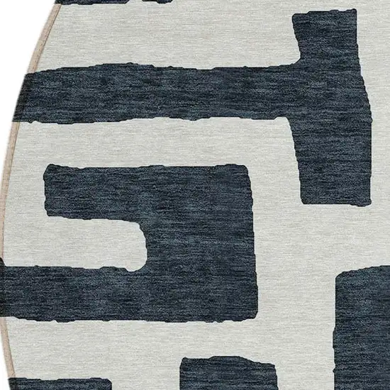 8' Black And Ivory Round Abstract Washable Indoor Outdoor Area Rug Photo 5