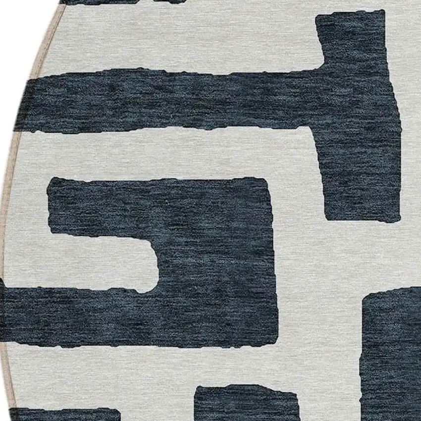8' Black And Ivory Round Abstract Washable Indoor Outdoor Area Rug Photo 5