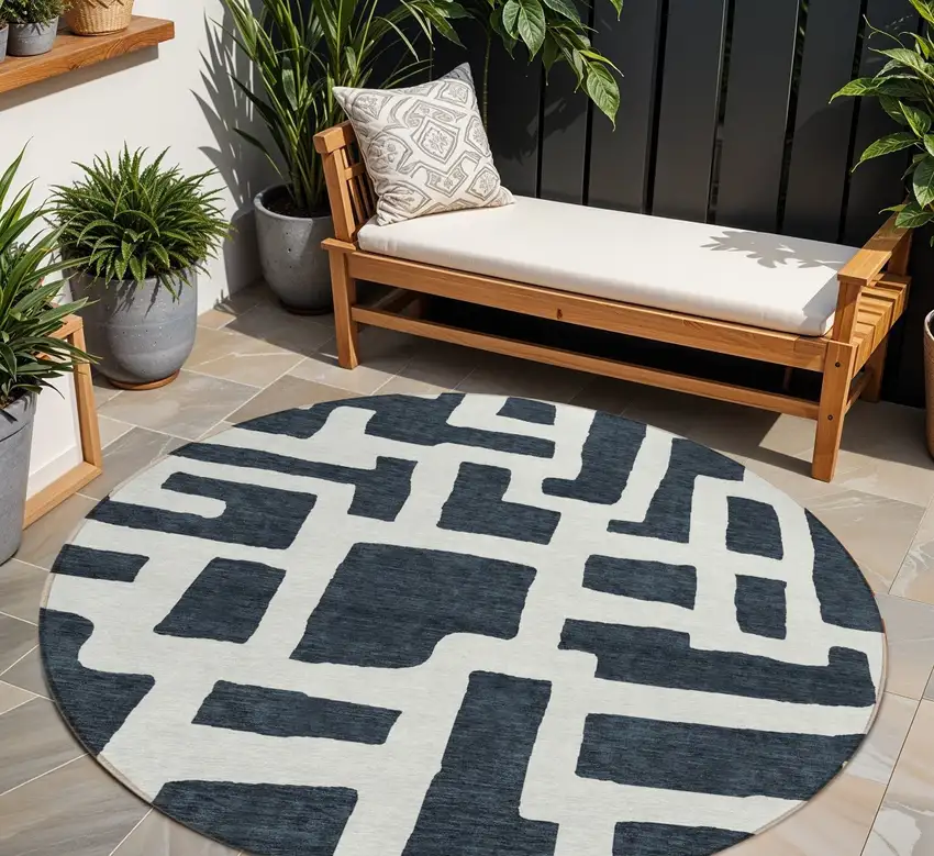 8' Black And Ivory Round Abstract Washable Indoor Outdoor Area Rug Photo 1