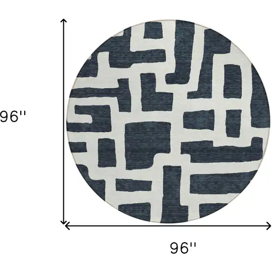 8' Black And Ivory Round Abstract Washable Indoor Outdoor Area Rug Photo 3