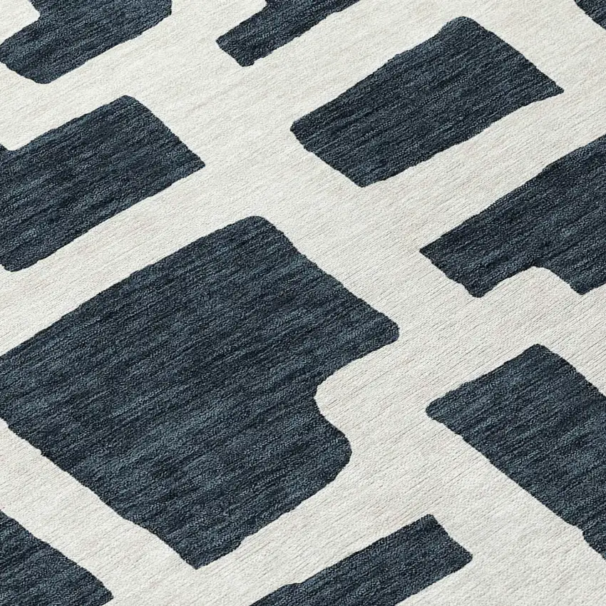 8' Black And Ivory Round Abstract Washable Indoor Outdoor Area Rug Photo 8