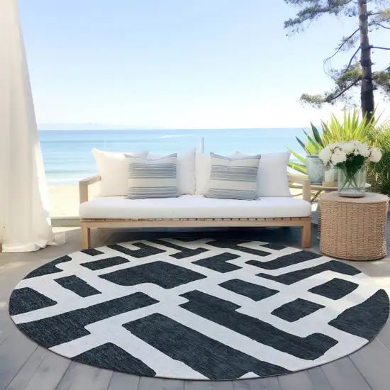 8' Black And Ivory Round Abstract Washable Indoor Outdoor Area Rug Photo 6