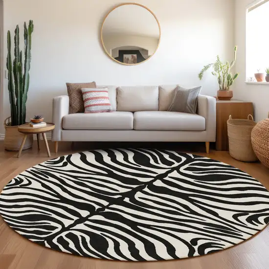 8' Black And Ivory Round Animal Print Washable Indoor Outdoor Area Rug Photo 8