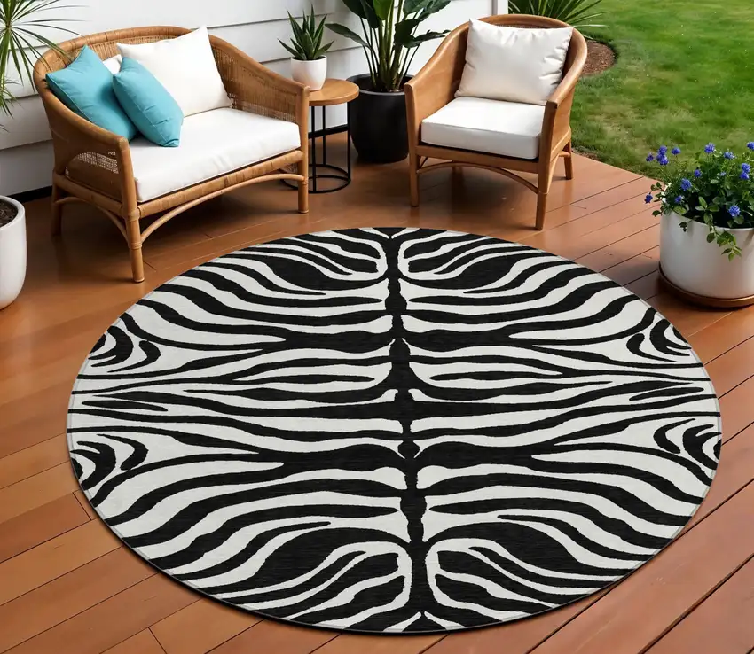 8' Black And Ivory Round Animal Print Washable Indoor Outdoor Area Rug Photo 1