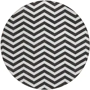 Photo of 8' Black And Ivory Round Chevron Washable Indoor Outdoor Area Rug
