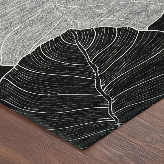8' Black And Ivory Round Floral Washable Indoor Outdoor Area Rug Photo 6