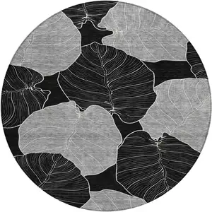 Photo of 8' Black And Ivory Round Floral Washable Indoor Outdoor Area Rug