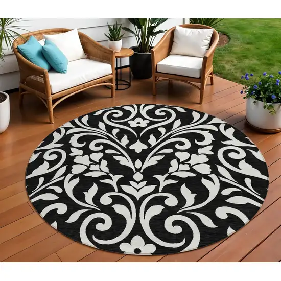 8' Black And Ivory Round Floral Washable Indoor Outdoor Area Rug Photo 1
