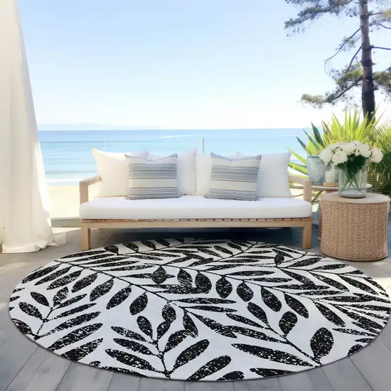 8' Black And Ivory Round Floral Washable Indoor Outdoor Area Rug Photo 5