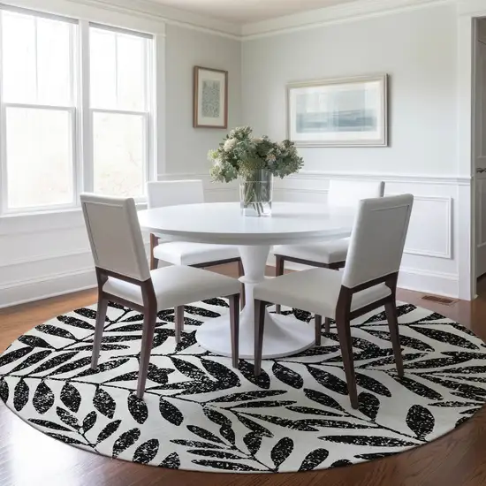 8' Black And Ivory Round Floral Washable Indoor Outdoor Area Rug Photo 6