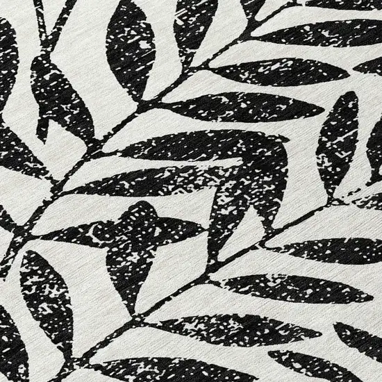 8' Black And Ivory Round Floral Washable Indoor Outdoor Area Rug Photo 7