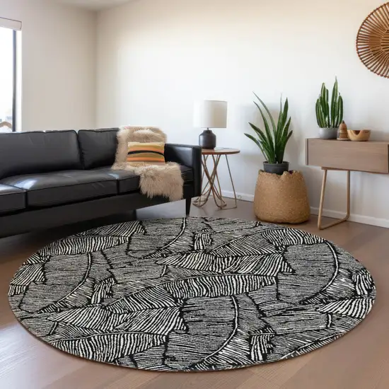 8' Black And Ivory Round Floral Washable Indoor Outdoor Area Rug Photo 8