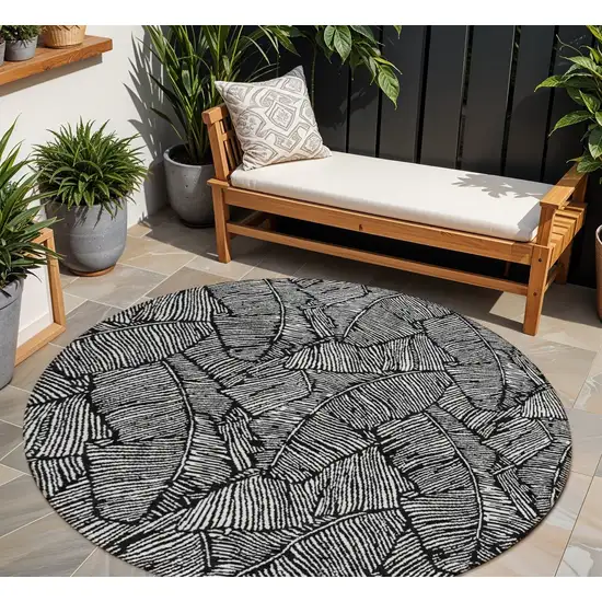 8' Black And Ivory Round Floral Washable Indoor Outdoor Area Rug Photo 1