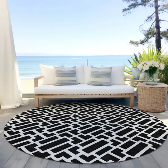 8' Black And Ivory Round Geometric Washable Indoor Outdoor Area Rug Photo 8