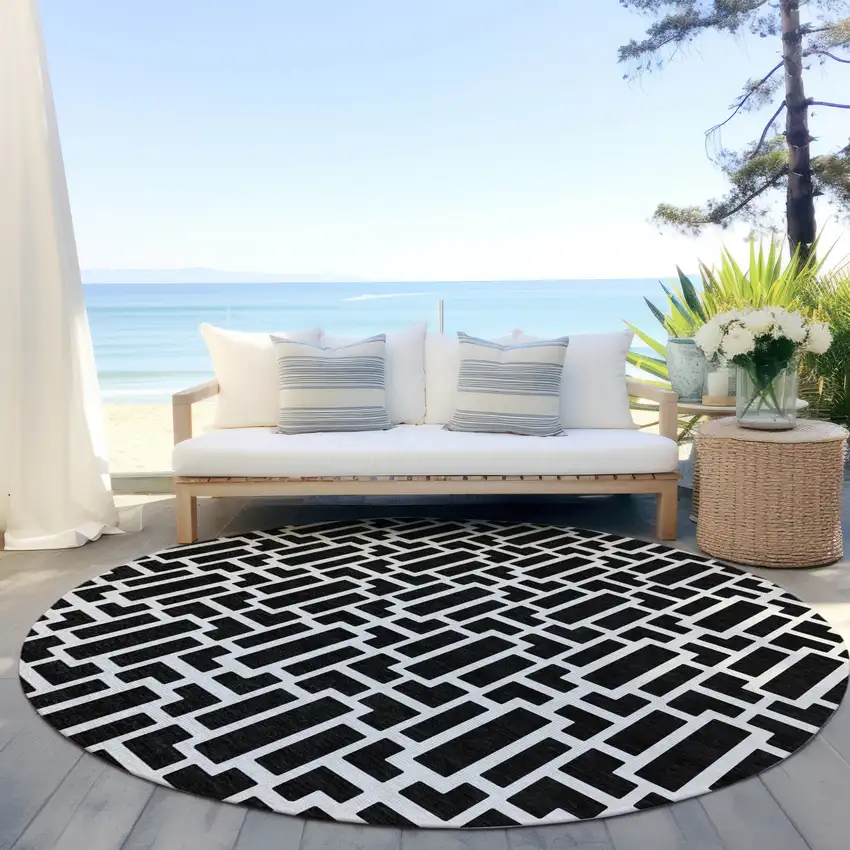 8' Black And Ivory Round Geometric Washable Indoor Outdoor Area Rug Photo 8