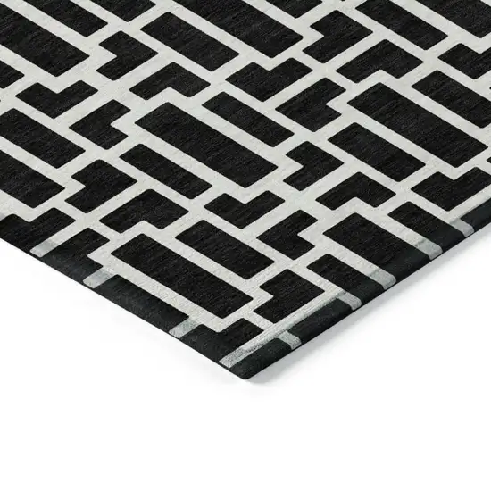 8' Black And Ivory Round Geometric Washable Indoor Outdoor Area Rug Photo 4