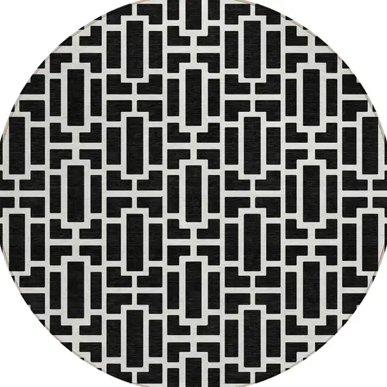 8' Black And Ivory Round Geometric Washable Indoor Outdoor Area Rug Photo 6