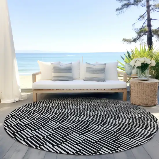 8' Black And Ivory Round Geometric Washable Indoor Outdoor Area Rug Photo 6