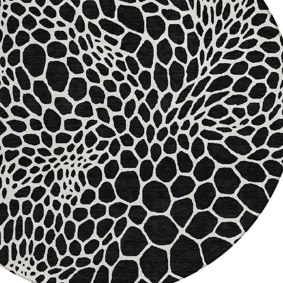 8' Black And Ivory Round Geometric Washable Indoor Outdoor Area Rug Photo 5