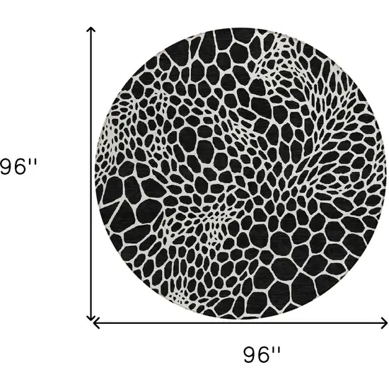8' Black And Ivory Round Geometric Washable Indoor Outdoor Area Rug Photo 3