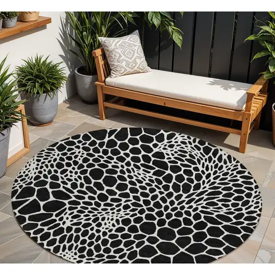 8' Black And Ivory Round Geometric Washable Indoor Outdoor Area Rug Photo 1