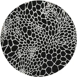 Photo of 8' Black And Ivory Round Geometric Washable Indoor Outdoor Area Rug
