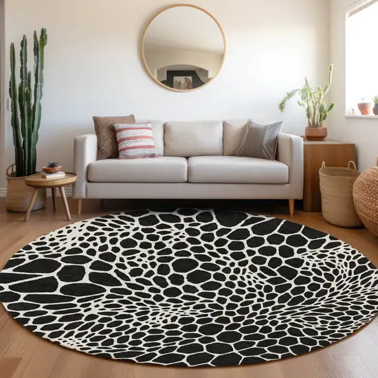8' Black And Ivory Round Geometric Washable Indoor Outdoor Area Rug Photo 8