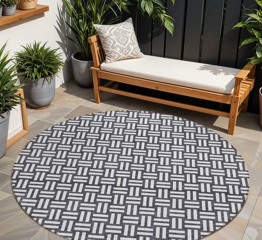 8' Black And Ivory Round Geometric Washable Indoor Outdoor Area Rug Photo 1
