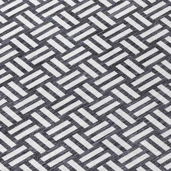 8' Black And Ivory Round Geometric Washable Indoor Outdoor Area Rug Photo 7