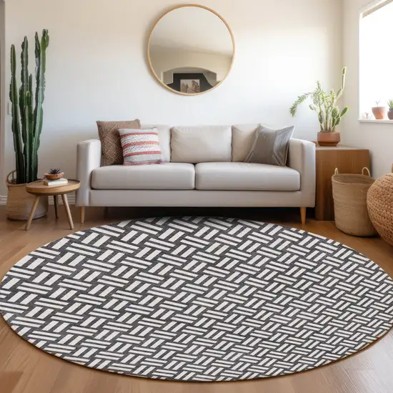 8' Black And Ivory Round Geometric Washable Indoor Outdoor Area Rug Photo 6