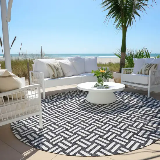8' Black And Ivory Round Geometric Washable Indoor Outdoor Area Rug Photo 5