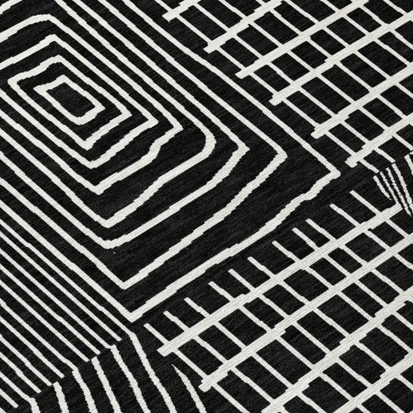 8' Black And Ivory Round Geometric Washable Indoor Outdoor Area Rug Photo 4