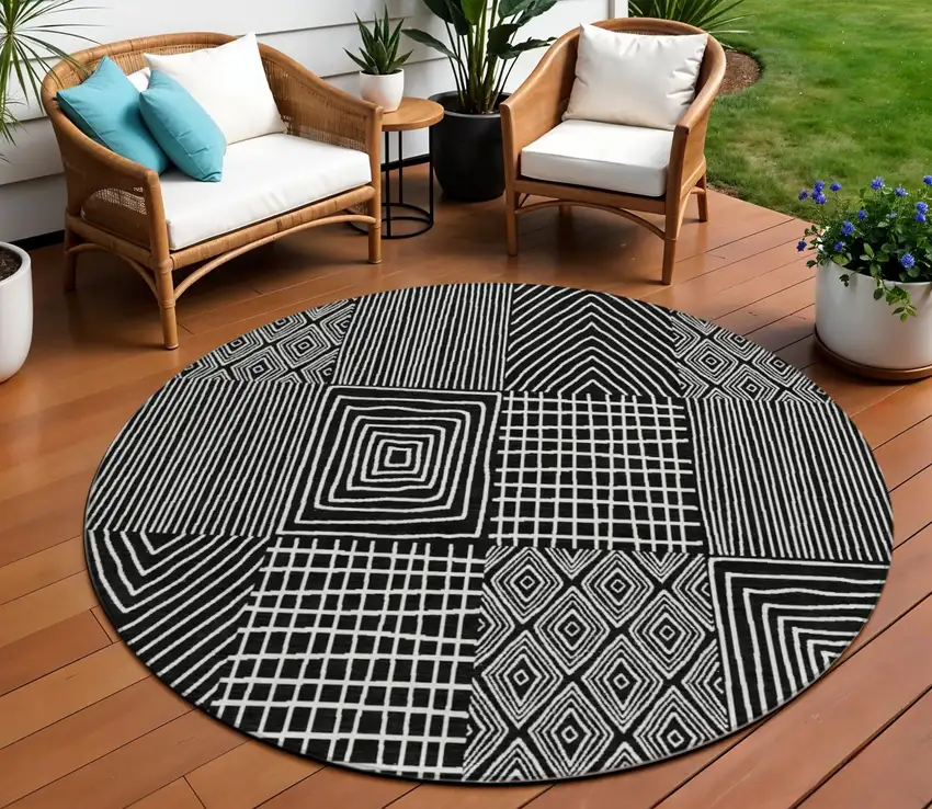 8' Black And Ivory Round Geometric Washable Indoor Outdoor Area Rug Photo 1