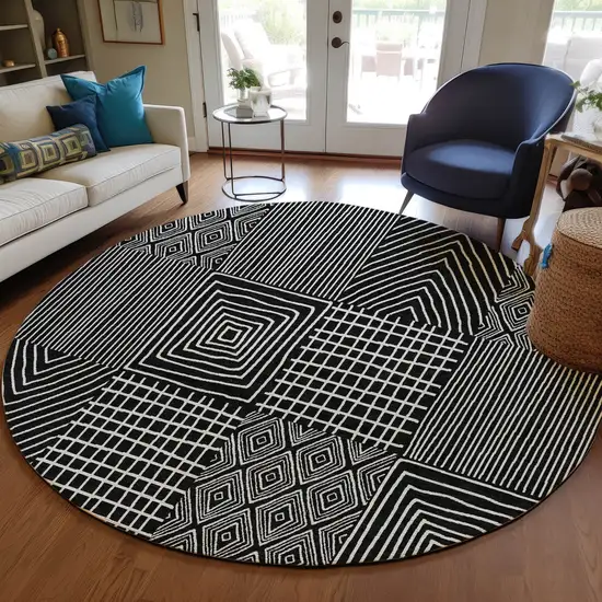 8' Black And Ivory Round Geometric Washable Indoor Outdoor Area Rug Photo 8