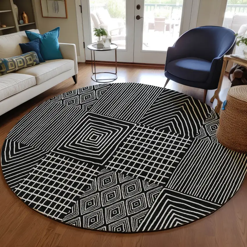 8' Black And Ivory Round Geometric Washable Indoor Outdoor Area Rug Photo 8