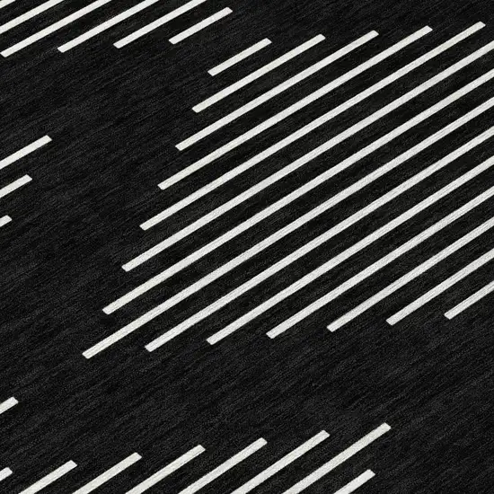 8' Black And Ivory Round Geometric Washable Indoor Outdoor Area Rug Photo 4