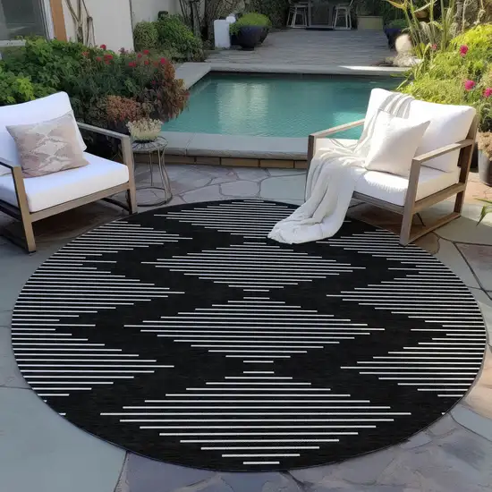 8' Black And Ivory Round Geometric Washable Indoor Outdoor Area Rug Photo 7