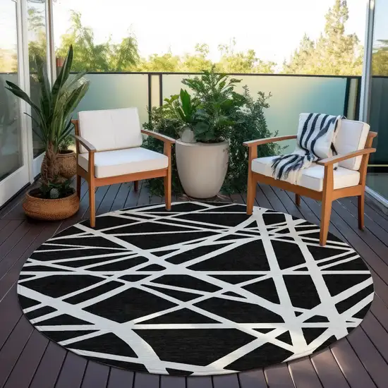 8' Black And Ivory Round Geometric Washable Indoor Outdoor Area Rug Photo 6