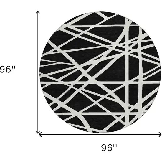 8' Black And Ivory Round Geometric Washable Indoor Outdoor Area Rug Photo 3