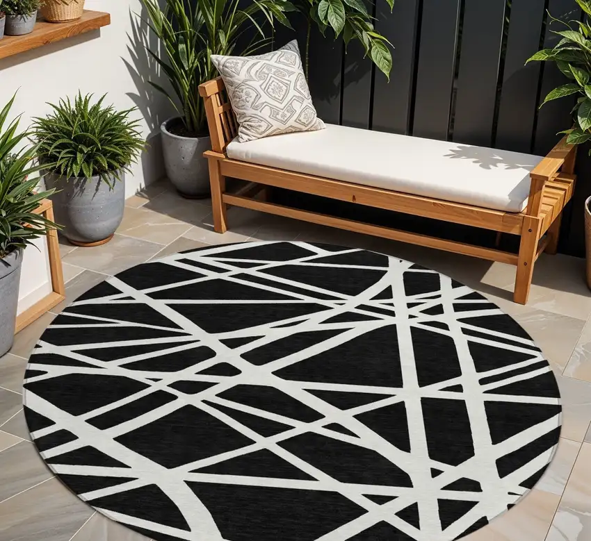 8' Black And Ivory Round Geometric Washable Indoor Outdoor Area Rug Photo 1